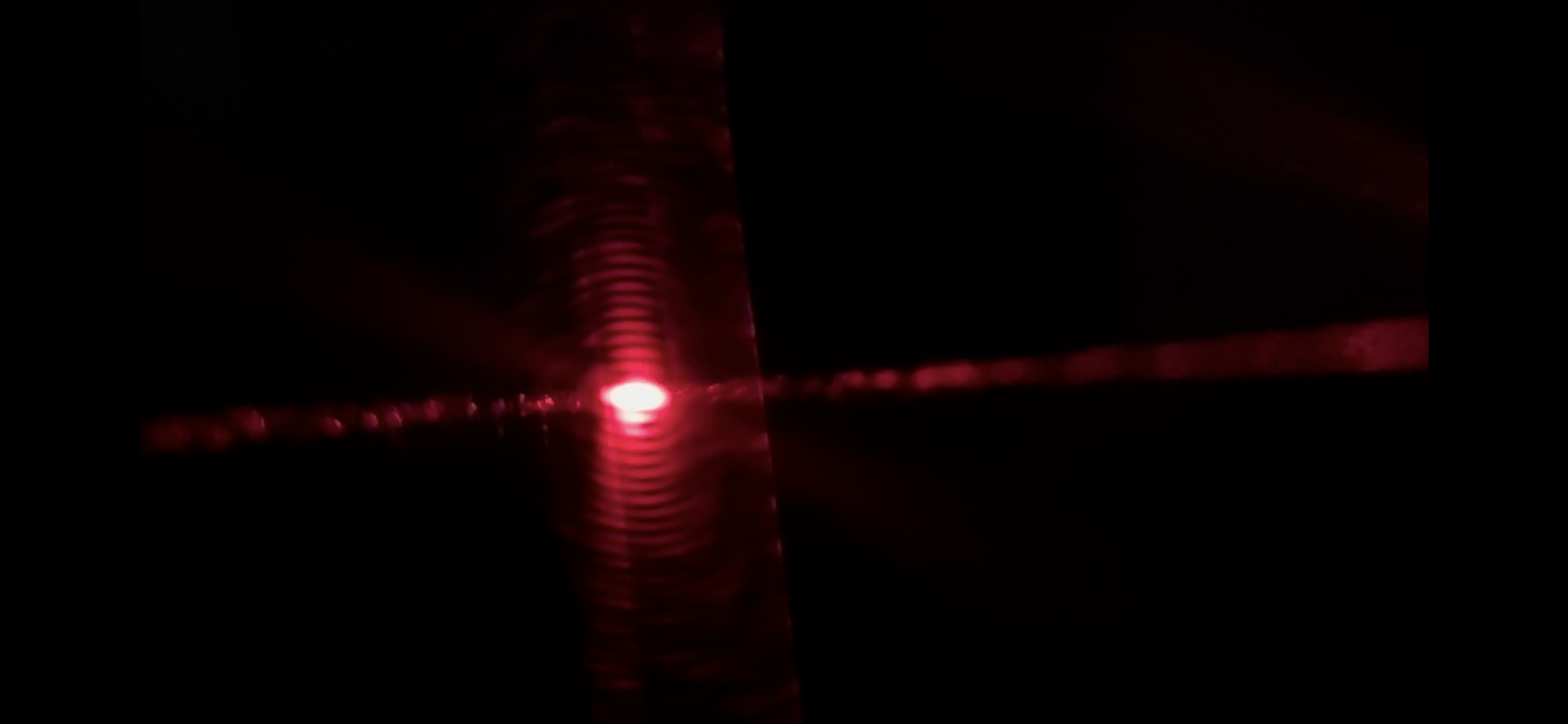 Reflected Laser Beam Through Smoke